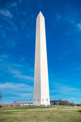 tall historical monument with perspective distortion and the movement of clouds in the atmosphere.