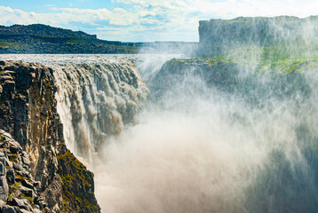 The Dettifoss waterfall is the most powerful waterfall in Europe, 200 cubic meters of water per second plunge over the edge. Dettifoss is 45 m high and 100m wide. In east Iceland