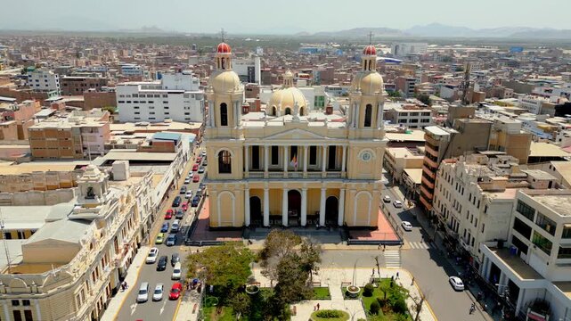 Aerial view of Chiclayo&rsquo;s Main Square featuring the Cathedral of Saint Mary of Chiclayo, landscaped gardens, central walkways, and active urban life surrounding this iconic landmark in northern Peru