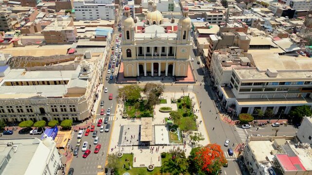 Aerial view of Chiclayo&rsquo;s Main Square featuring the Cathedral of Saint Mary of Chiclayo, landscaped gardens, central walkways, and active urban life surrounding this iconic landmark in northern Peru