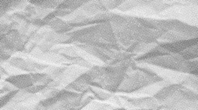 Halftone crumpled paper texture with black a dotted, rough, and wrinkled surface. Wite creased sheet background in comic pop-art style, featuring grainy folds and gritty distressed details.