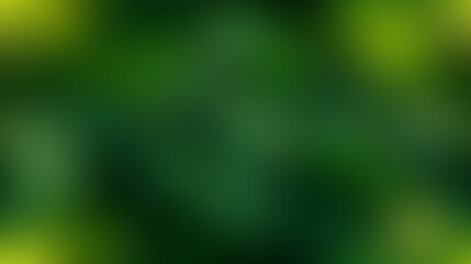 A soft focus abstract background of deep green and yellow hues.