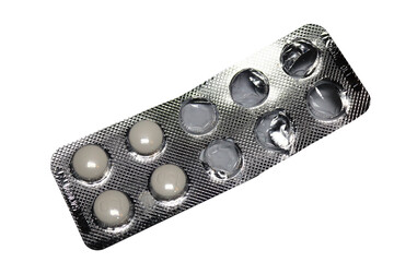 A blister pack of pills on a clean white surface, perfect for medical or pharmaceutical use