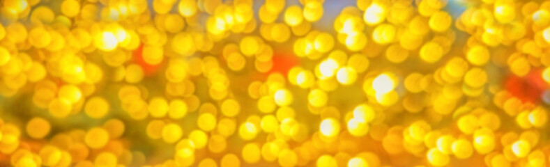 Warm glowing holiday lights with golden bokeh, elegant Christmas background