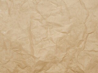 Obraz premium Detailed close up of crumpled light brown kraft paper texture background with visible wrinkles and grain 