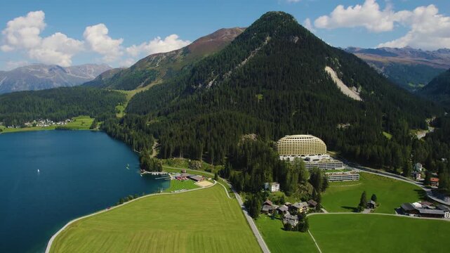 An aerial panorama view around the downtown of the city Davos in Switzerland on a sunny summer day 