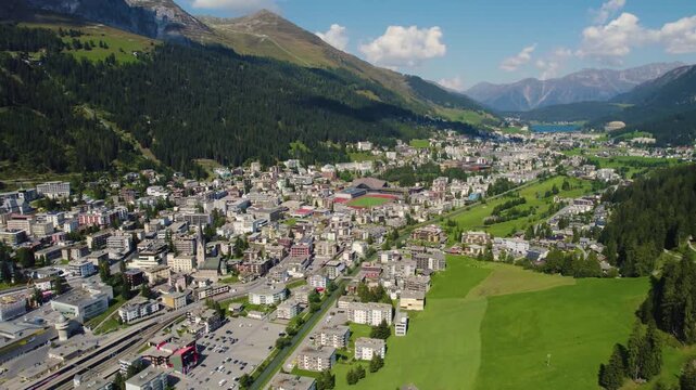 An aerial panorama view around the downtown of the city Davos in Switzerland on a sunny summer day 