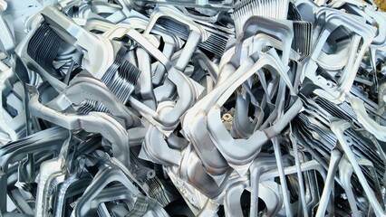 close up of a pile of steel plates