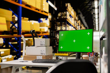 Empty warehouse with mockup display on computer monitor, ideal for logistics or tracking software or e-commerce dashboards. Surrounded by shelves, racks and boxes for order processing.