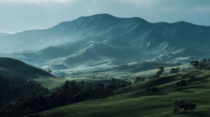 Dramatic Highland Vista: Rolling Green Hills and Misty Mountain Peaks
