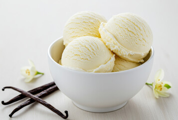 Close-up of a white bowl filled with three scoops of cookie vanilla ice cream, garnished with a cookies