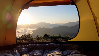 View of mountains through tent opening with sleeping bag inside on camping trip