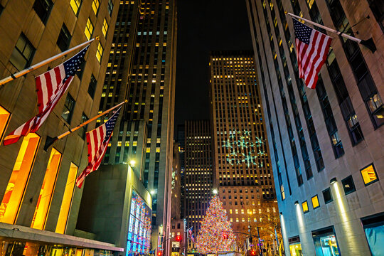 New York winter cityscape with holiday decorations. New York City Christmas celebration downtown. Christmas tree in NYC as iconic landmark. Winter holiday in New York urban scene.