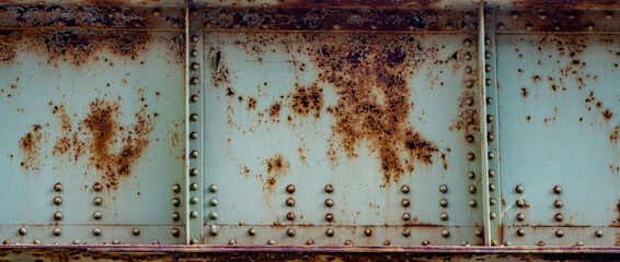 Corroded steel background for construction. Rust stains for repair services design. Metal panel texture for construction branding. Grunge rust pattern for design use. Bridge corrosion for engineering.