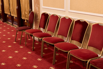 Configured Seating Area With Luxurious Furnishings For Important Participants During Formal Proceedings