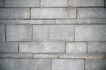 Fototapeta premium Gray stone wall texture with modern rectangular pattern