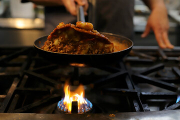 chef preparing gnocchi by hand in the traditional way
