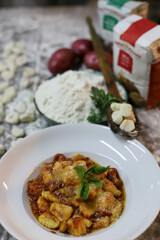 chef preparing gnocchi by hand in the traditional way