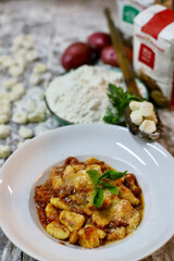 chef preparing gnocchi by hand in the traditional way