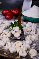 chef preparing gnocchi by hand in the traditional way