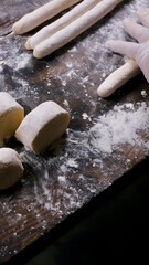chef preparing gnocchi by hand in the traditional way