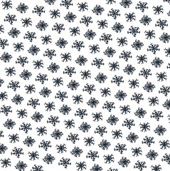 Large, beautiful, patterned snowflakes form a winter background.