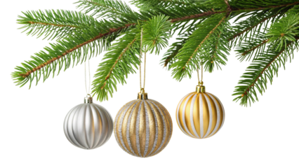 Close up of fir tree branches with gold and silver Christmas ornaments hanging gold ornaments