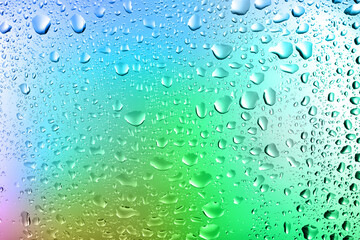 Glass surface with water drops, closeup view