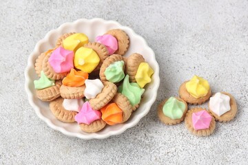 Belly button iced gem biscuits. Small round biscuits with colorful candy on top, usually this old...