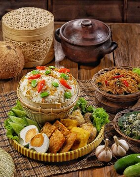 Nasi Liwet Sunda. Sundanese liwet rice is a rice dish cooked in a special way using various spices and herbs.