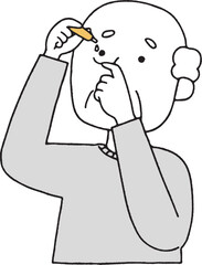 目薬を指すシニア男性単色