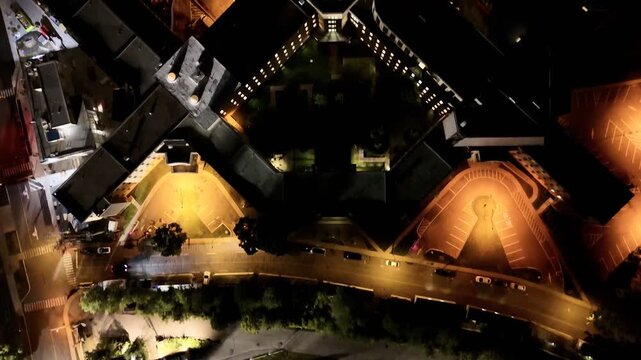 Aerial night view of University of Montreal and Vincent d Indy School of Music with illuminated campus and city lights. g.