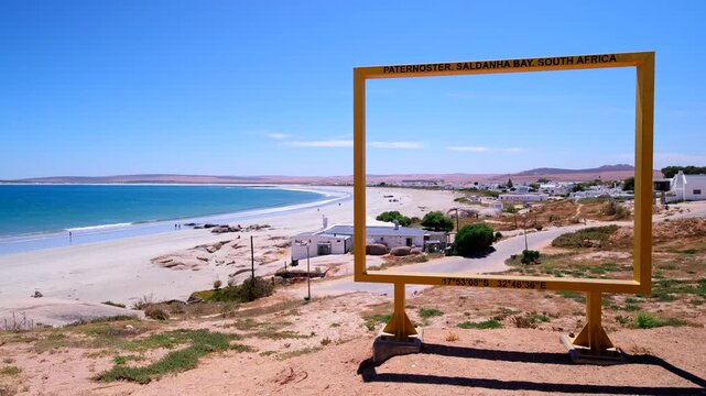 Paternoster tourism yellow frame at vantage point overlooking white sand beach