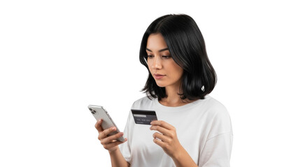 Fototapeta premium Young woman holding credit card and mobile phone in white background studio shot
