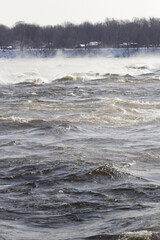 Powerful Winter River Waves with Mist and Cold Air