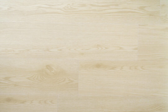 Seamless light-colored wood grain flooring