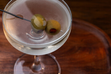 High contrast image of a vodka martini served up and chilled.
