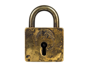 Close-up of antique gold padlock with keyhole and loop