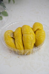 durian fruit or smelly fruit, king of fruit. ripe durian and tasty durian that has been peeled. Freshly harvested durian fruit with delicious golden yellow soft flesh . Type of musang king 