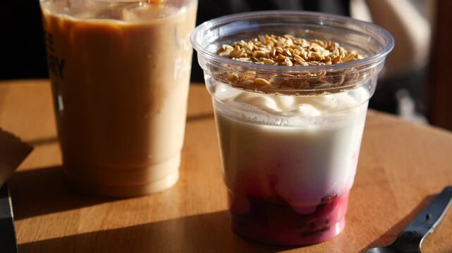 Enjoying yogurt parfait at a local cafe