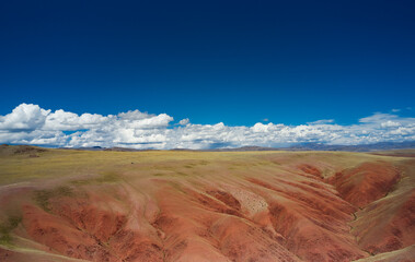 Aerial from drone of Altai mountain landscape in Altai mountains. Red clay canyon near village Kororya.