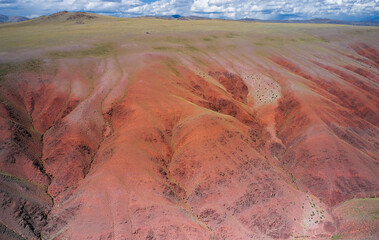Aerial from drone of Altai mountain landscape in Altai mountains. Red clay canyon near village Kororya.