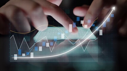 A business professional examines financial information on a smartphone with digital graphs showcasing market trends and growth, emphasizing data-driven decisions. Copula