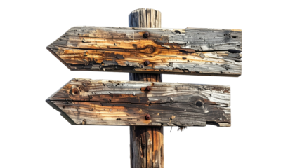 Weathered wooden directional sign with two arrows pointing in opposite directions