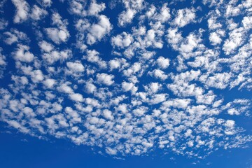 Bright Blue Sky Filled with Altocumulus Clouds on a Sunny Day at Daytime with Natural Light Atmosphere Scenic View Tranquil Weather Pattern