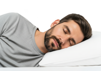Man sleeping on white pillow isolated on transparent background, resting peacefully