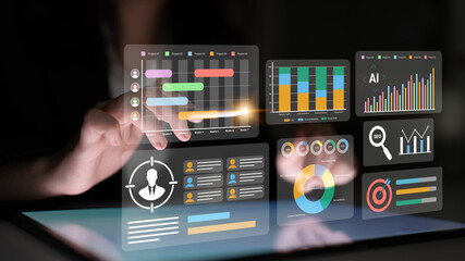 Explore the innovative use of technology in data analysis through touchscreen interaction, featuring various graphs and charts in a sleek digital workspace. Gantry