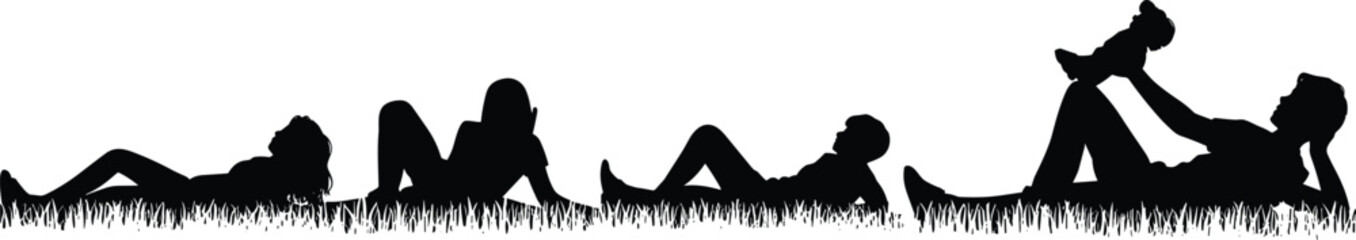 Silhouettes of people lying on grass in relaxed poses showing family bonding, leisure, and outdoor rest in nature