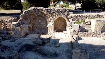 Discover the beauty of ancient stone ruins showcasing well-preserved arches and walls. This historical site invites exploration and appreciation of its rich heritage.