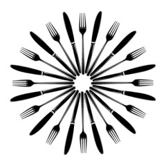 Black Silver Forks and Knives Arranged in Circular Pattern on White Background